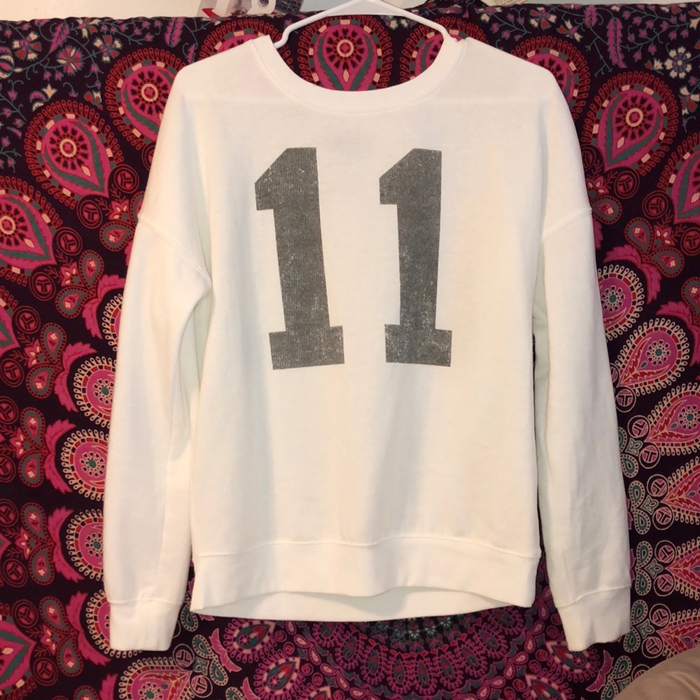 White eleven sweater